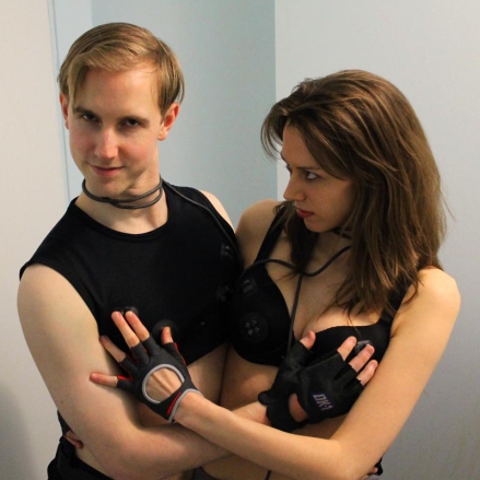 Silly Daniele and Kyle wearing PS1 controller bra and bro gamepads
