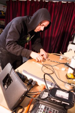 Daeve Fellows cutting LED strips to size